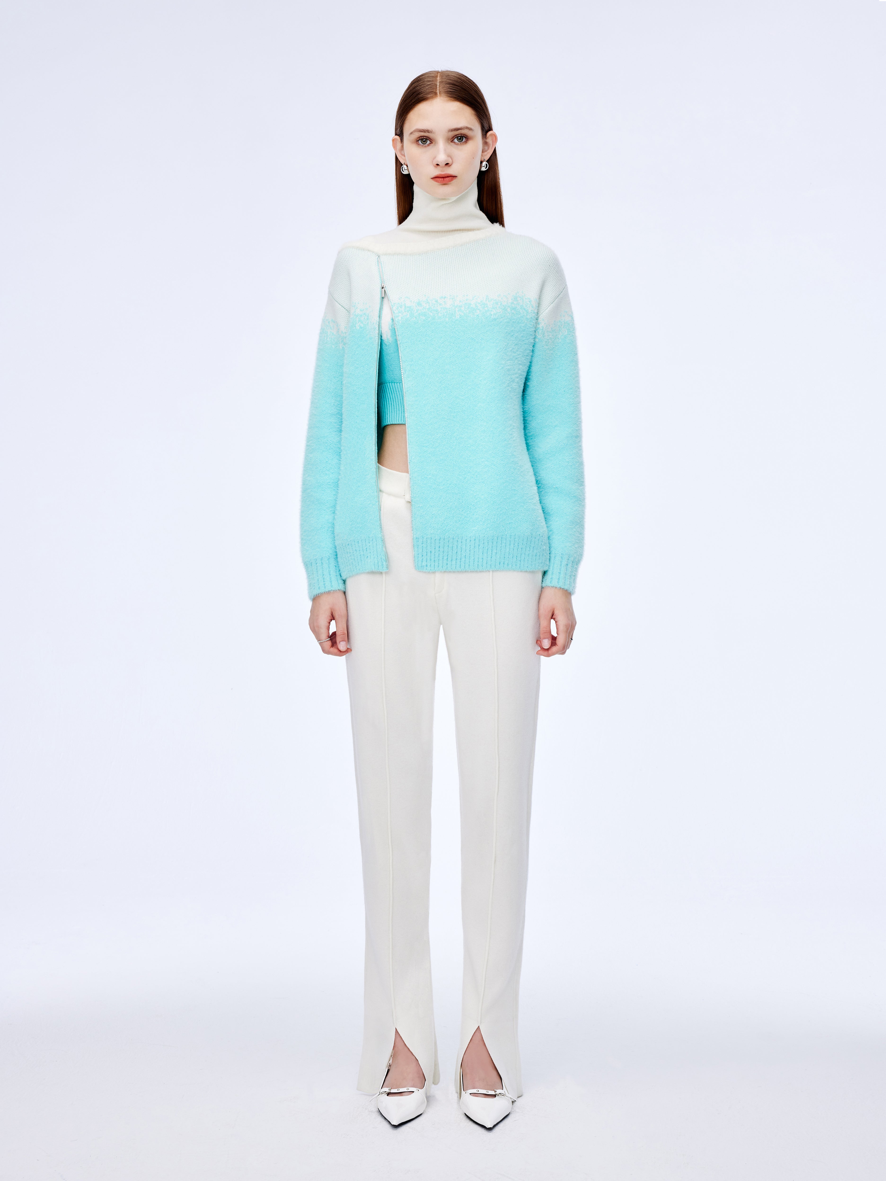 Jersey con cuello alto y cremallera diagonal