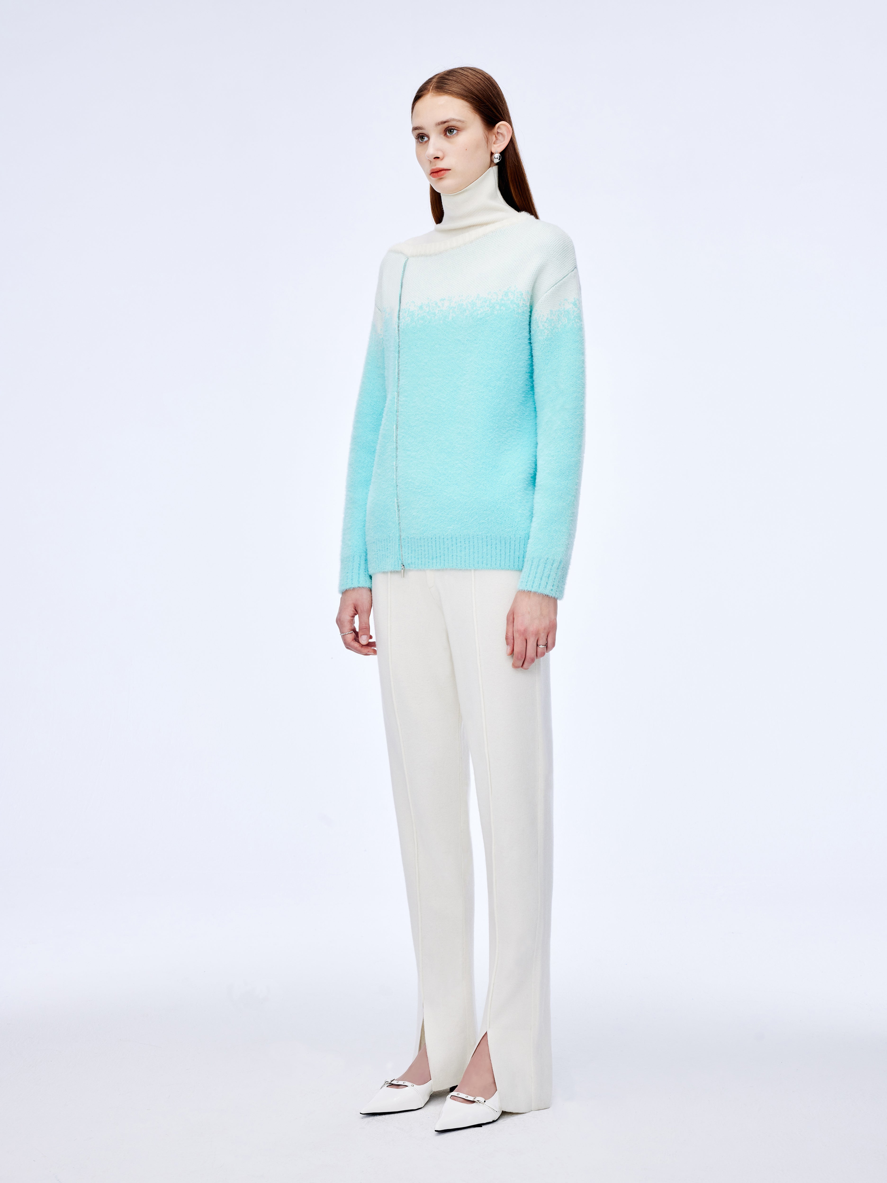 Jersey con cuello alto y cremallera diagonal