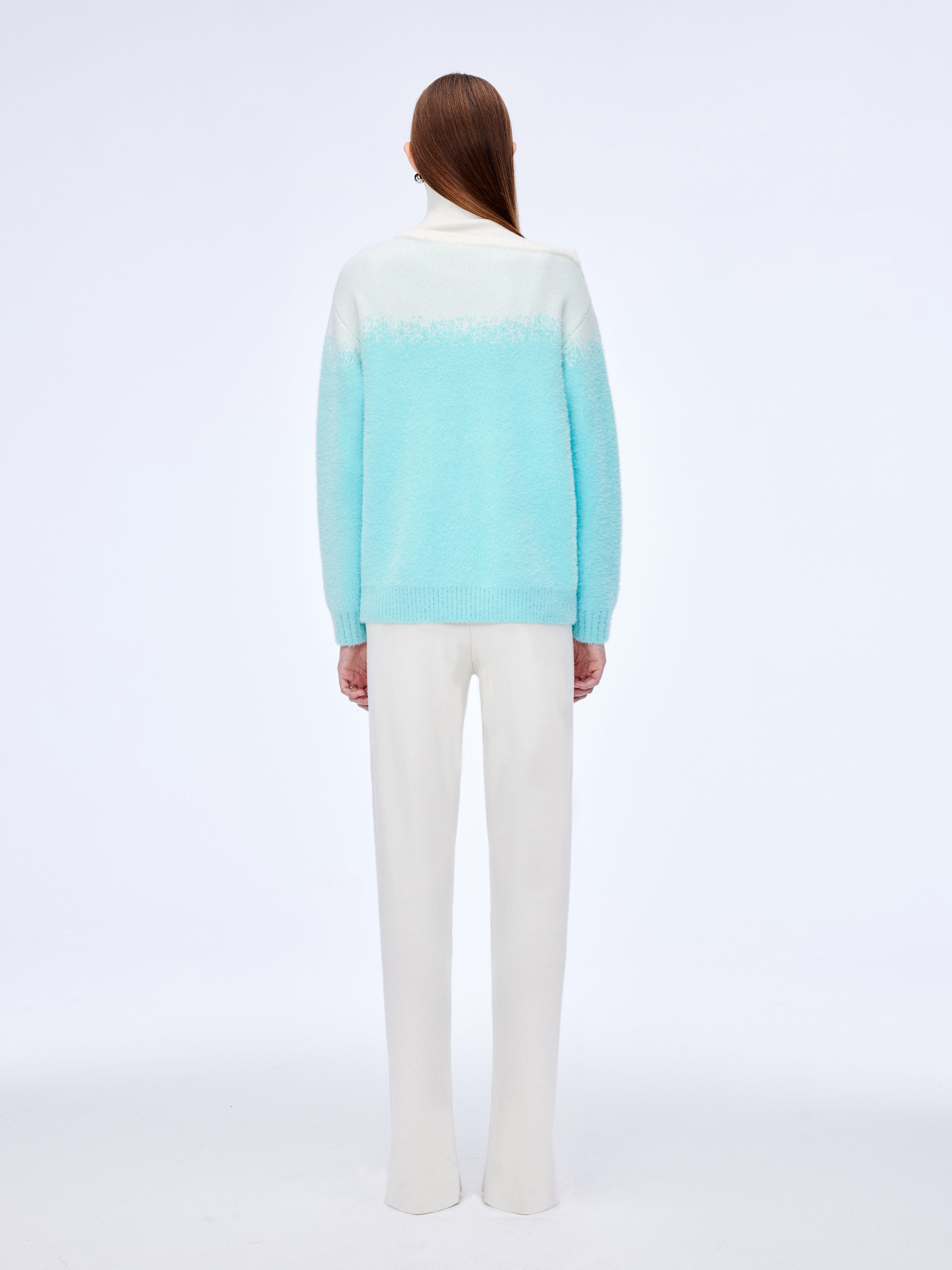 Jersey con cuello alto y cremallera diagonal