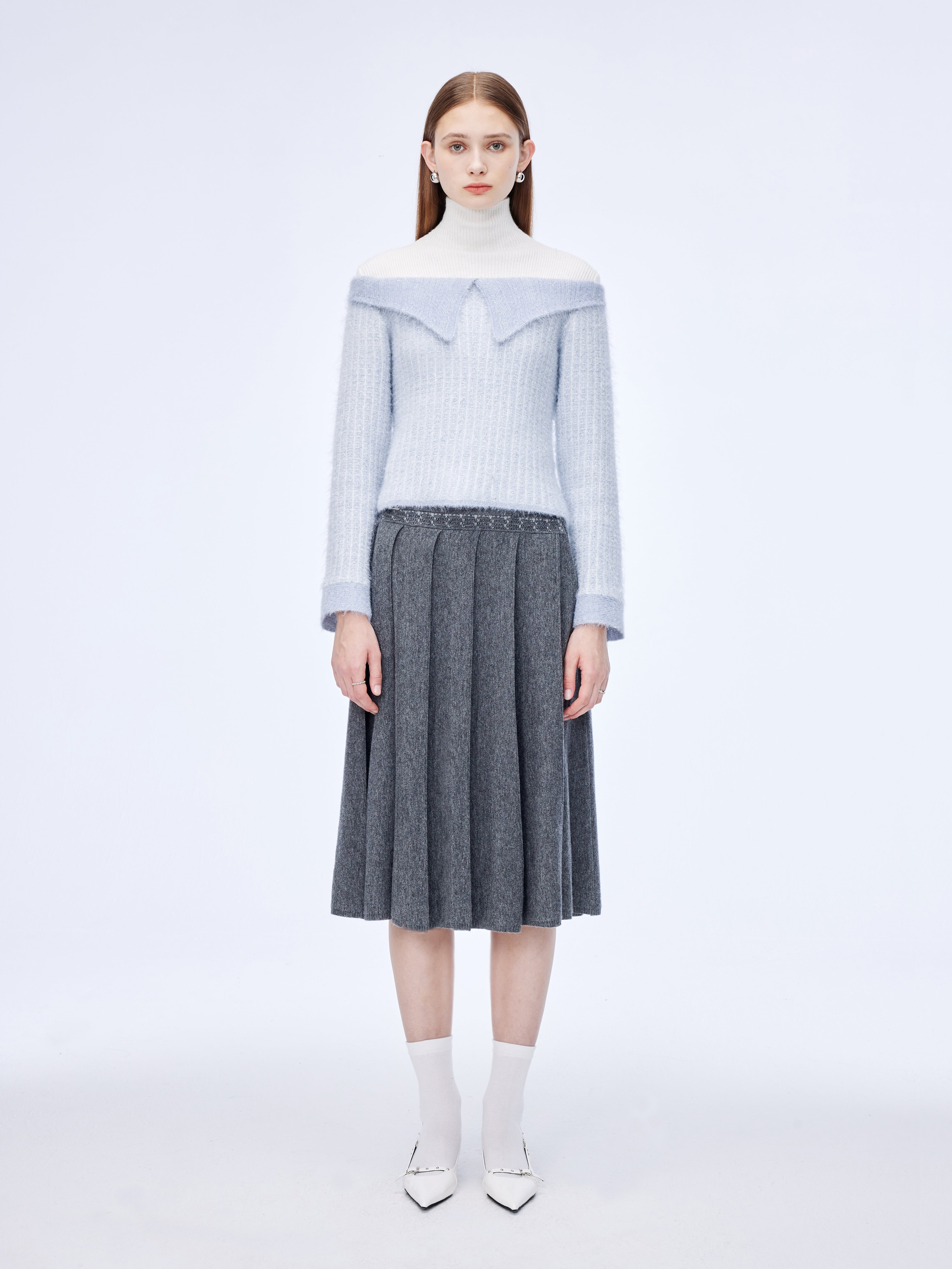 Jersey con cuello alto y patchwork