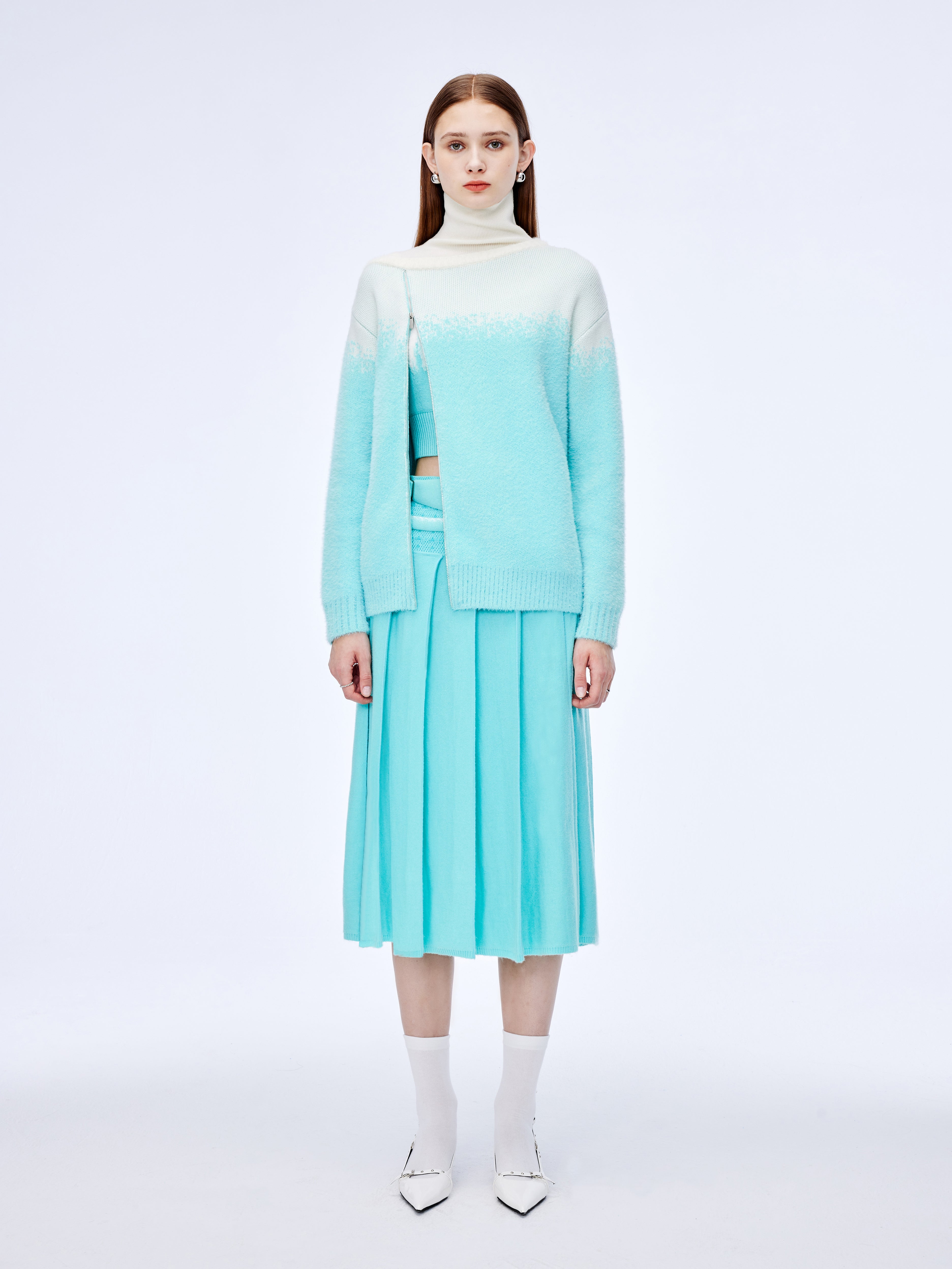 Jersey con cuello alto y cremallera diagonal