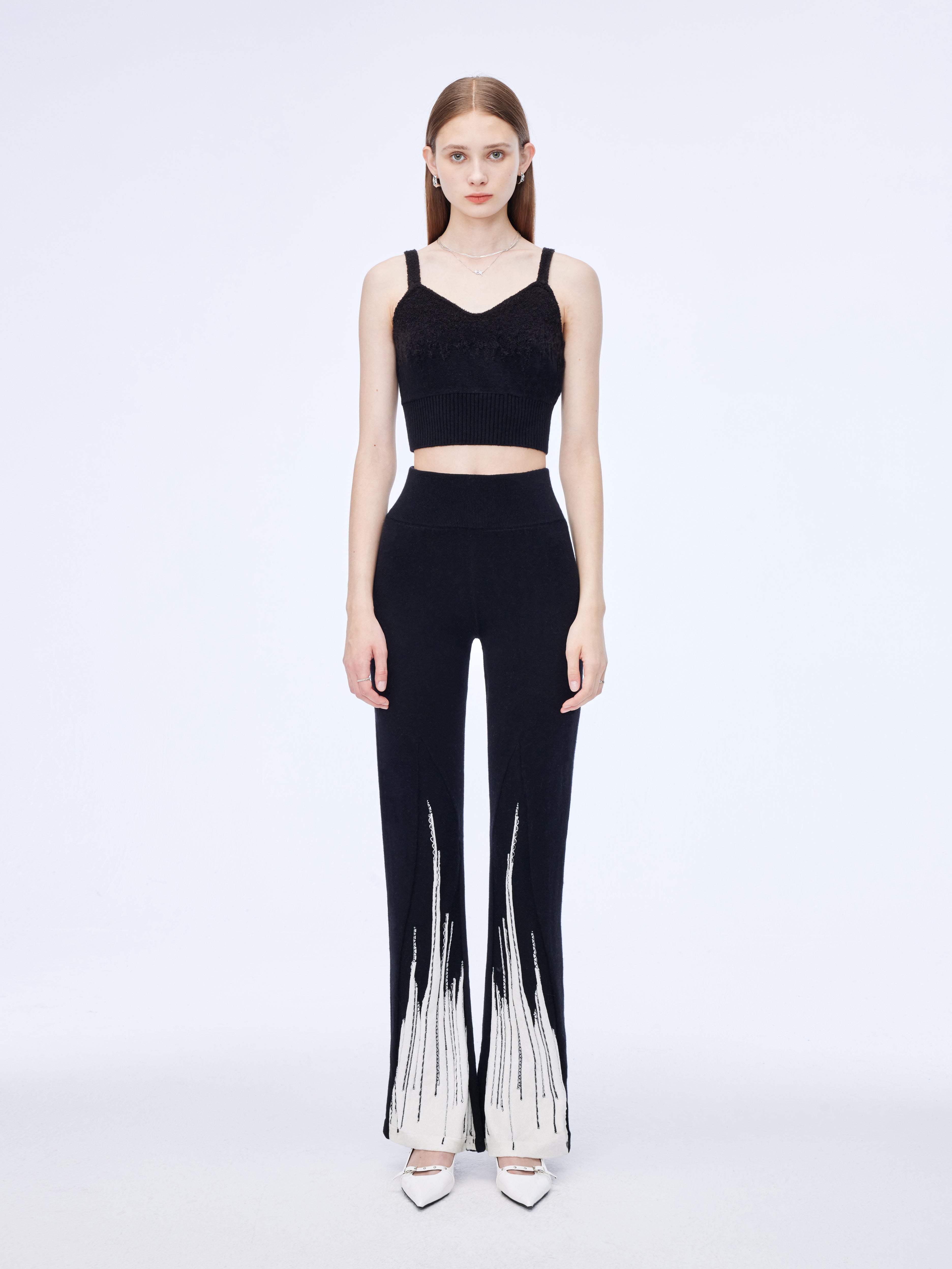 Flared cuff trousers