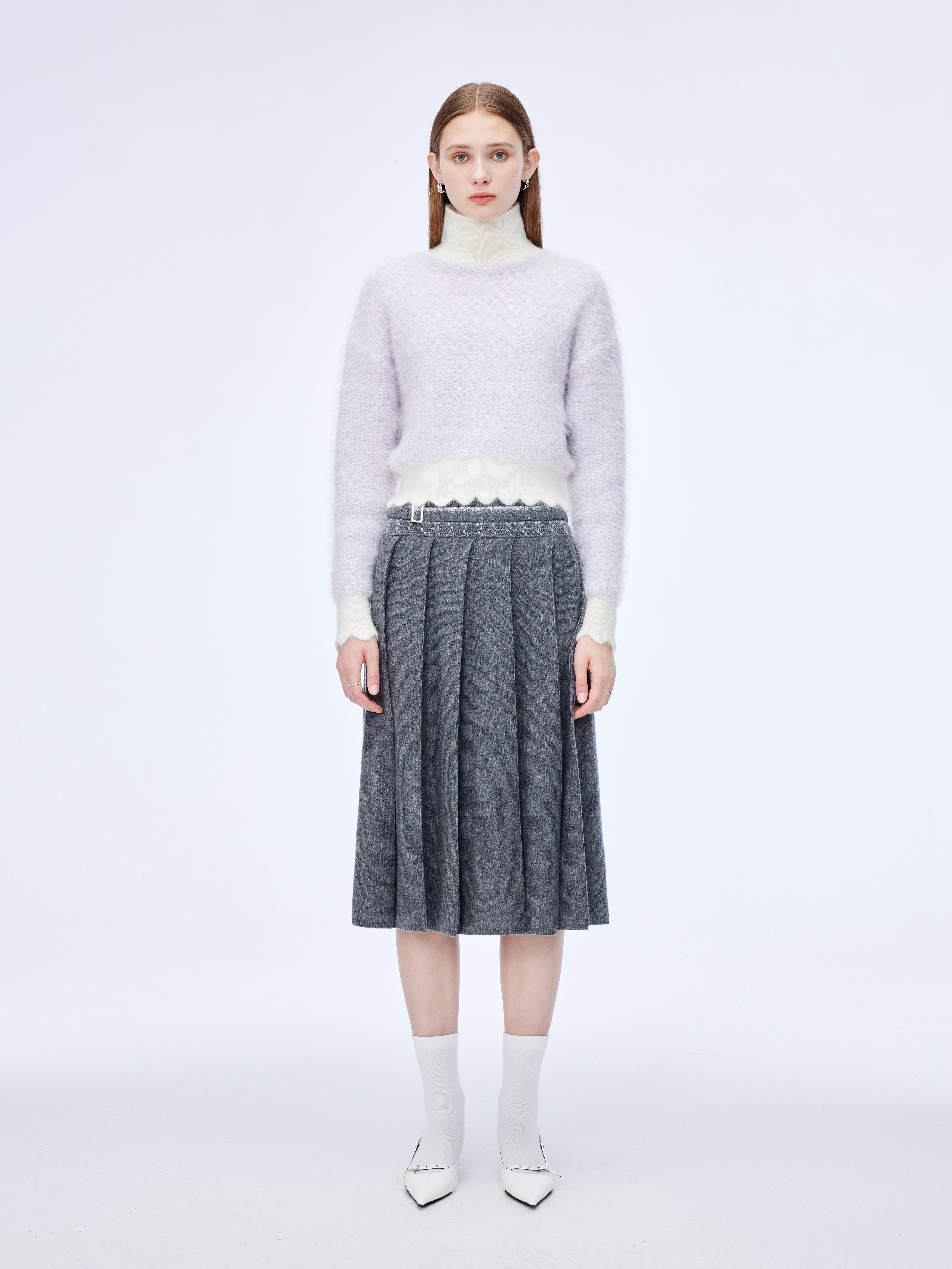 Wave-edged shimmery roll-neck jumper