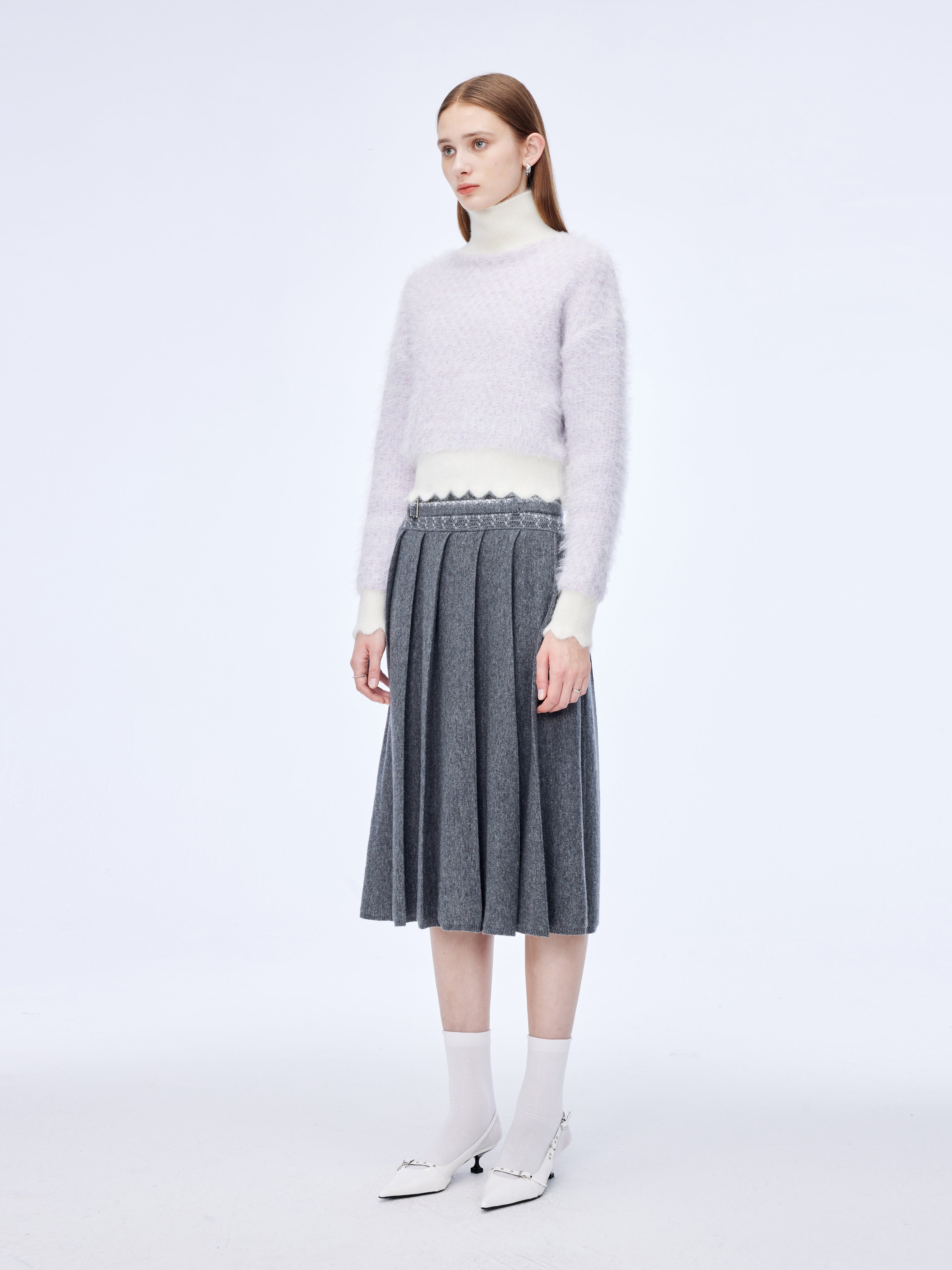 Wave-edged shimmery roll-neck jumper