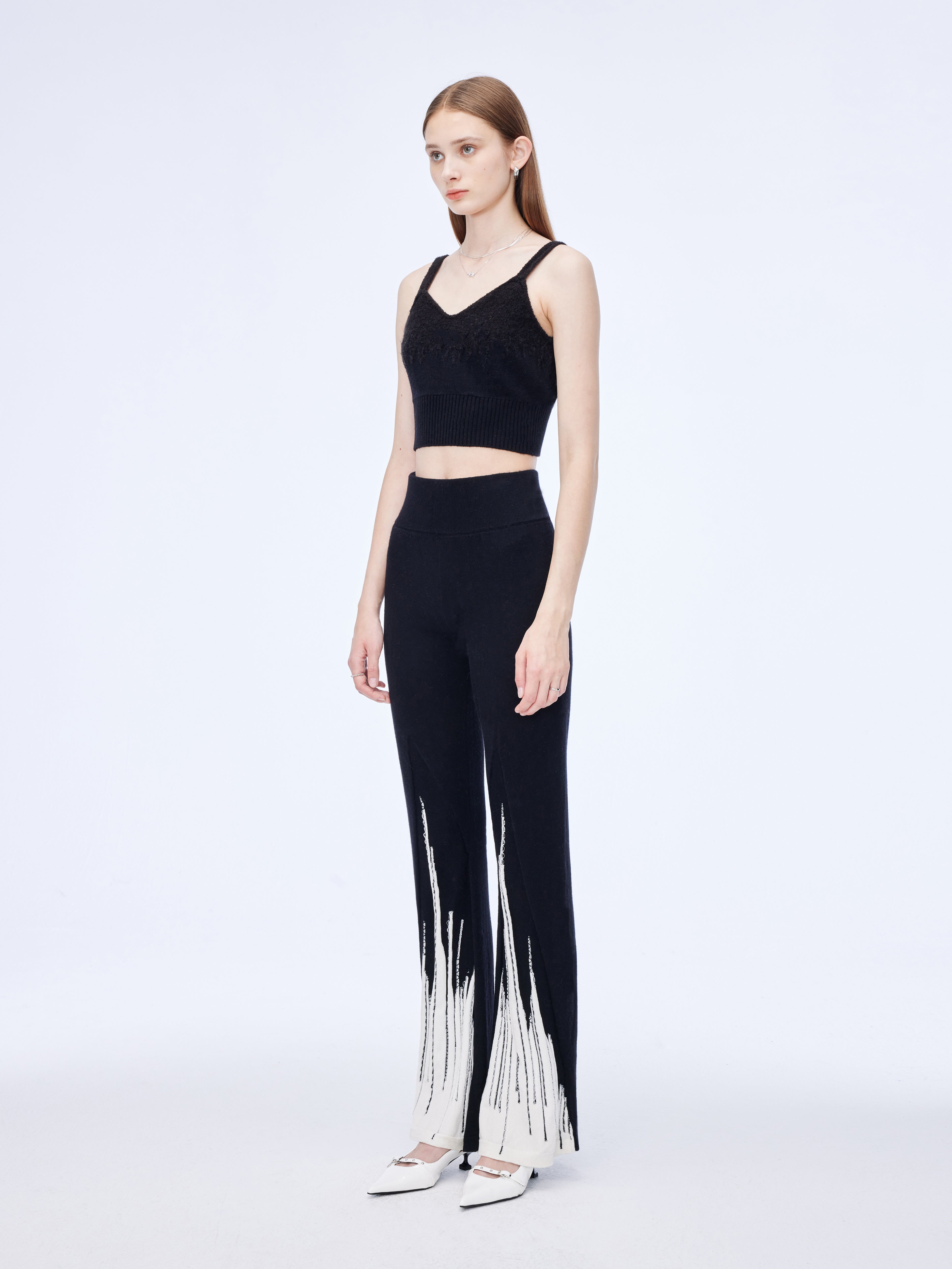 Flared cuff trousers