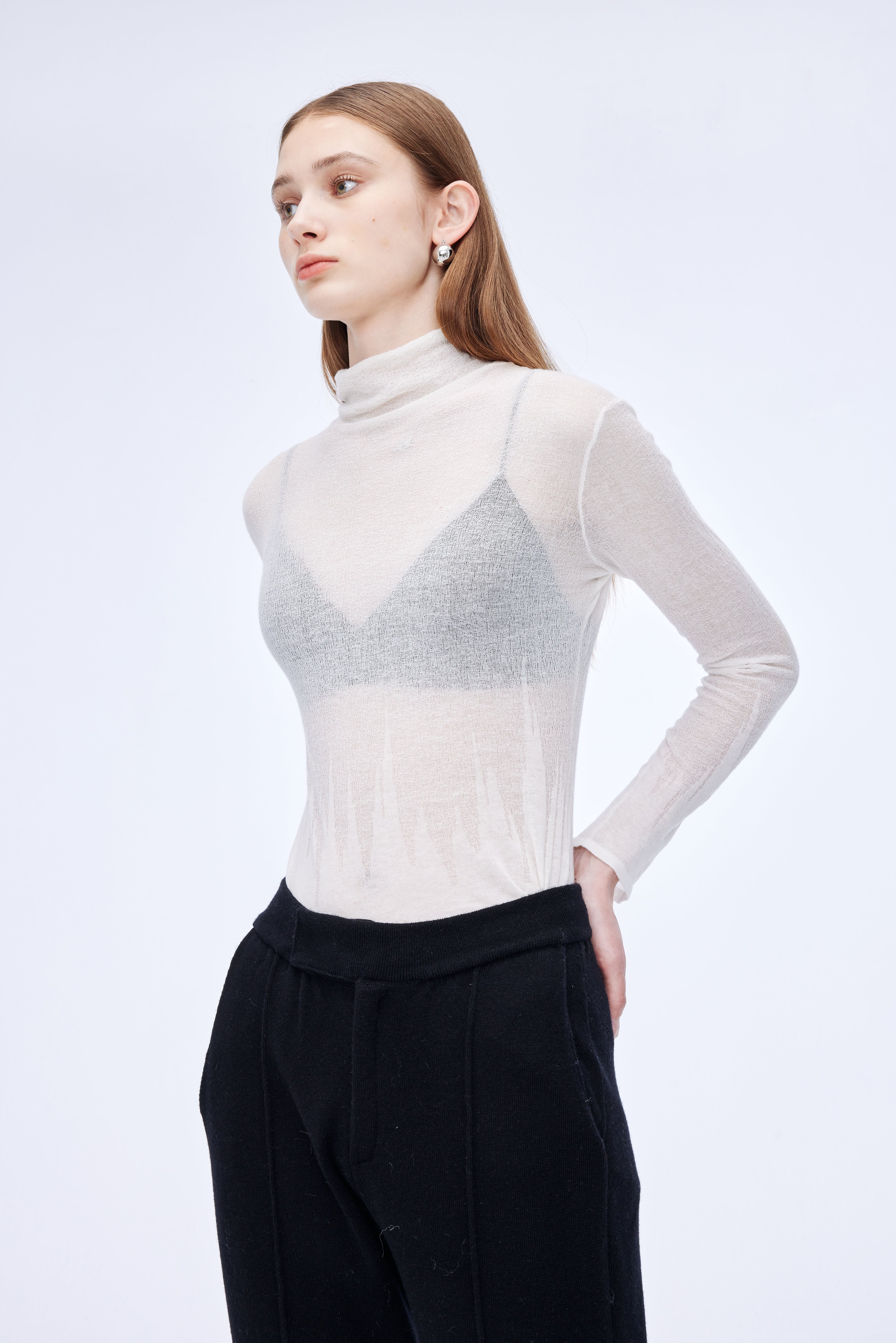 High neck pattern slightly translucent top