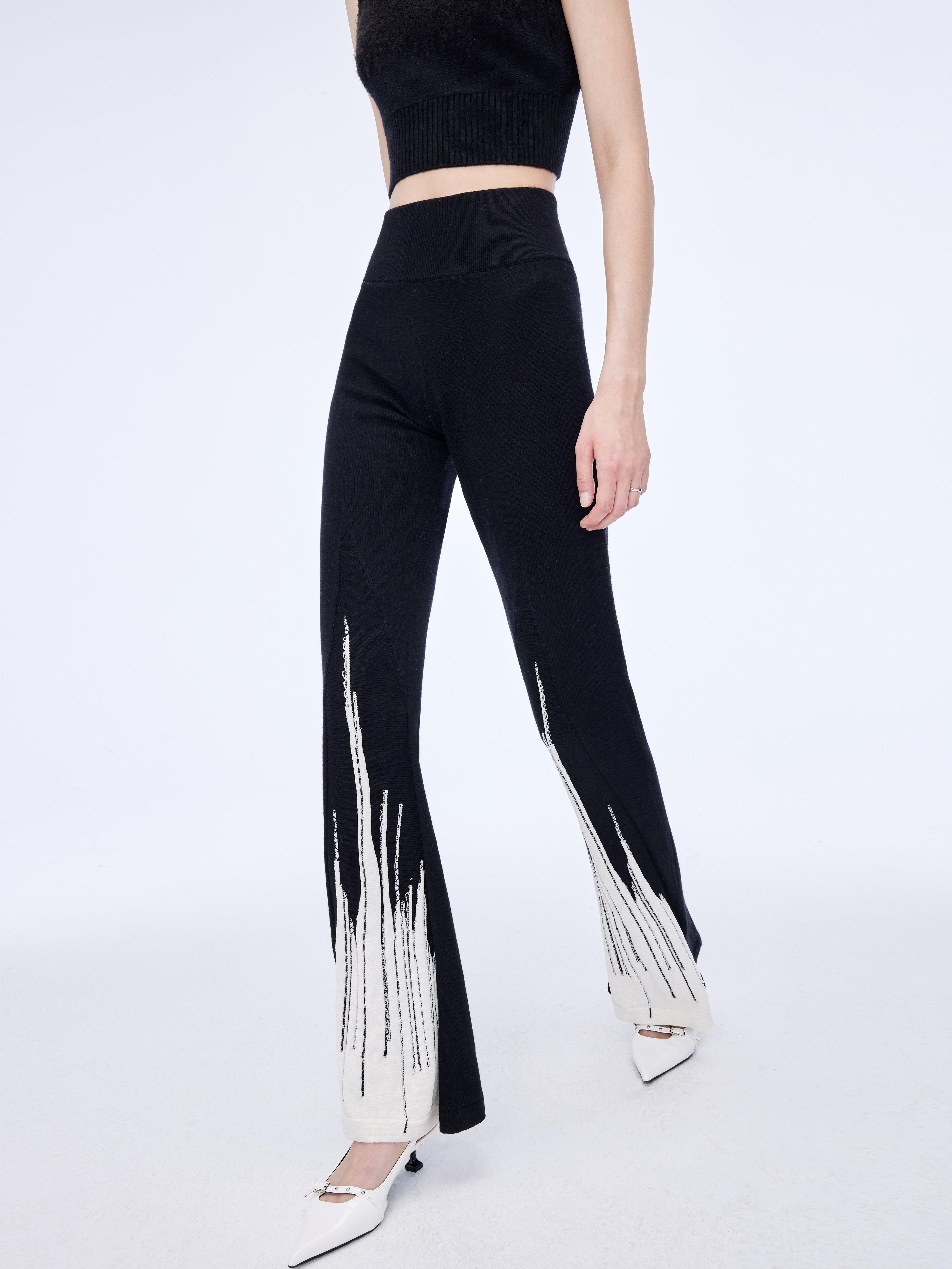 Flared cuff trousers