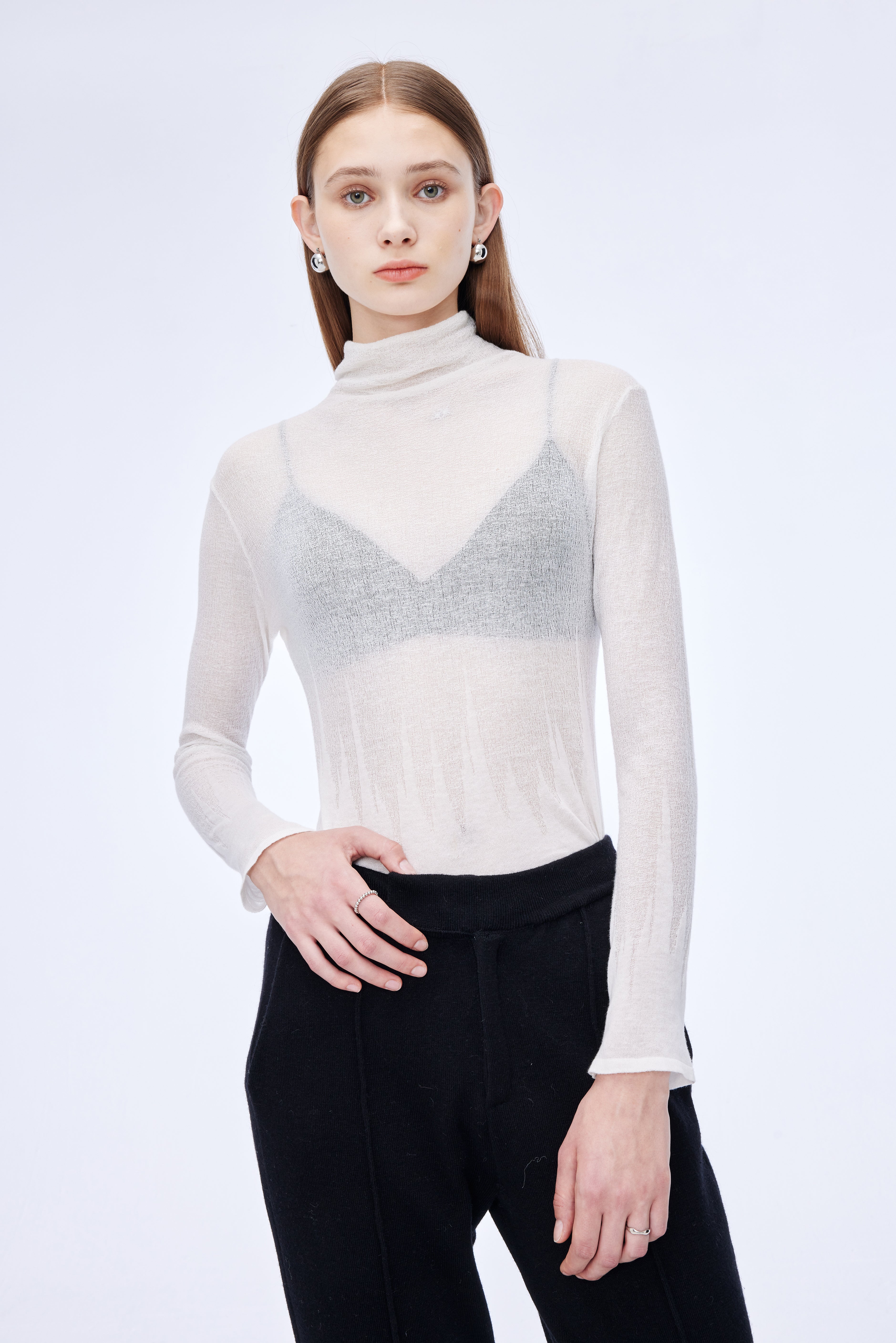 High neck pattern slightly translucent top