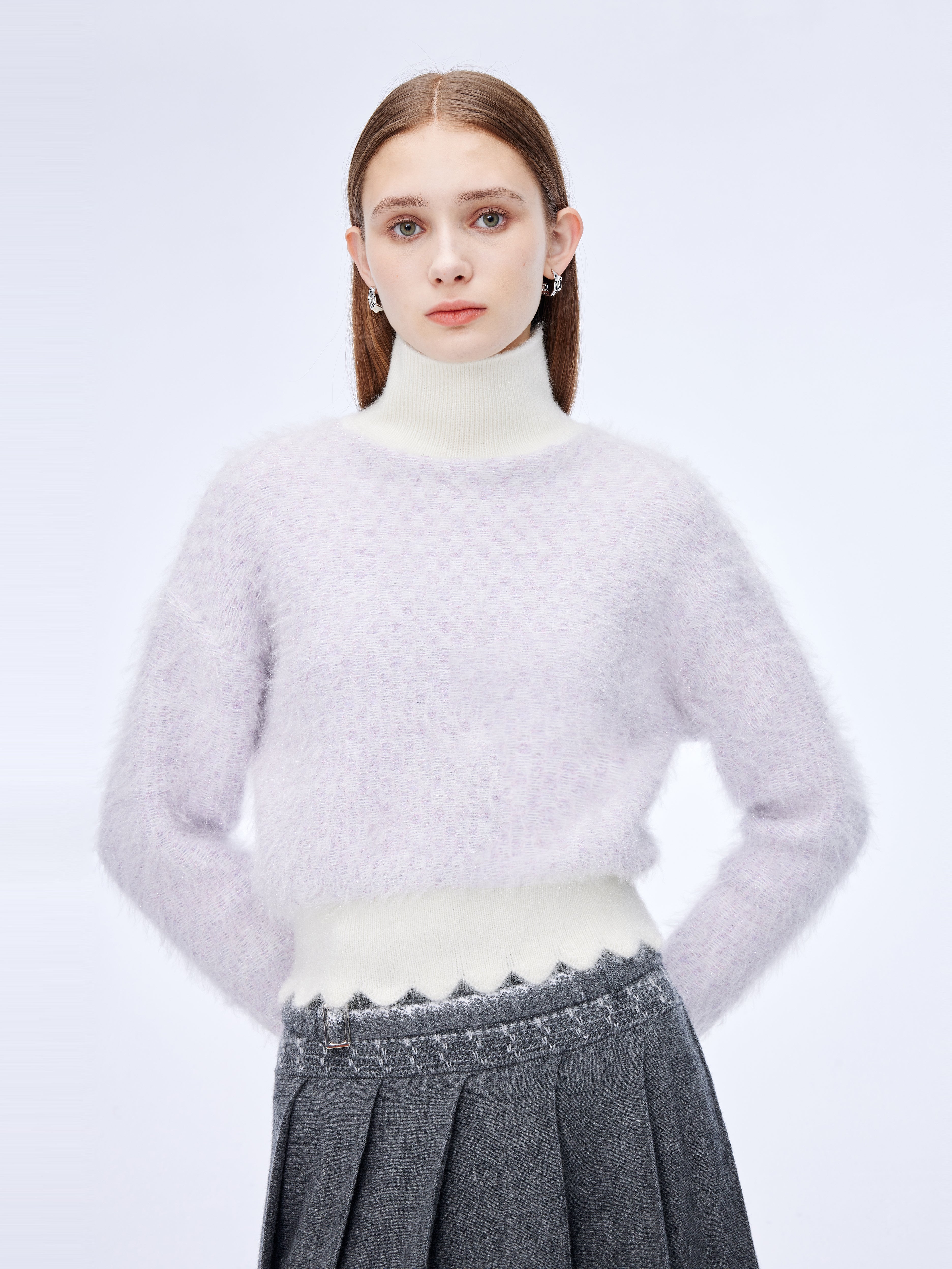 Wave-edged shimmery roll-neck jumper