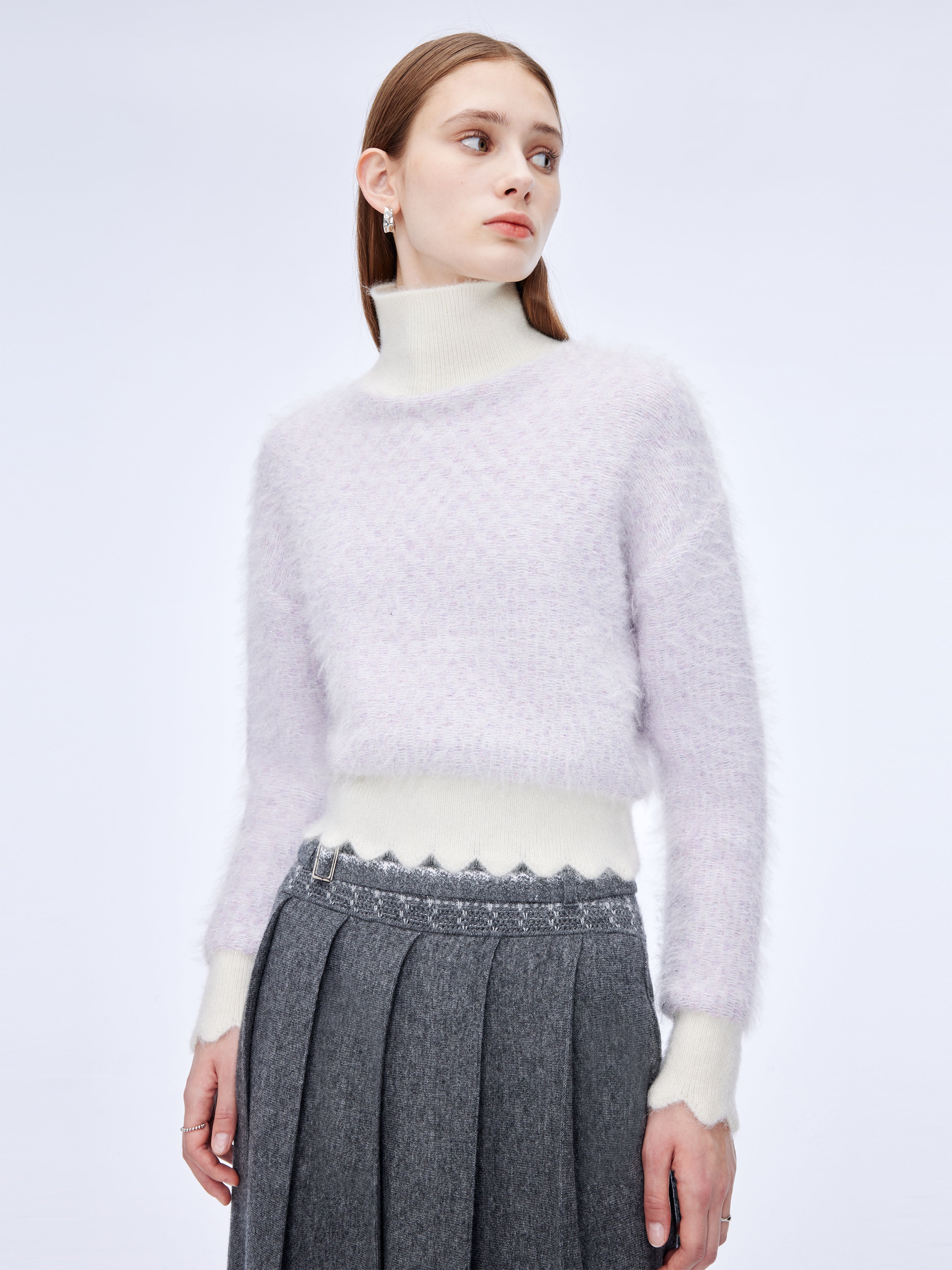 Wave-edged shimmery roll-neck jumper